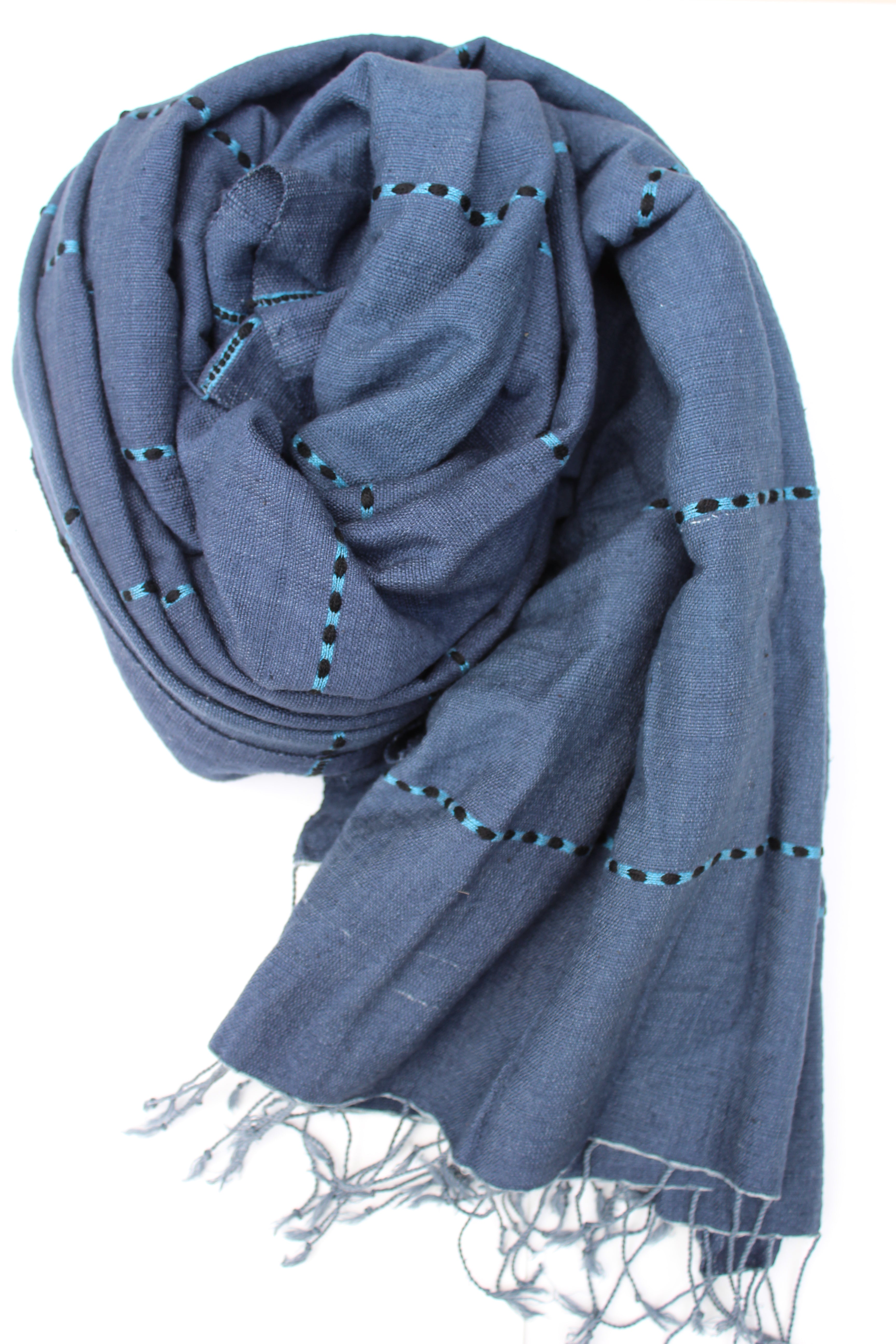 Blue scarf with fringe on a white background