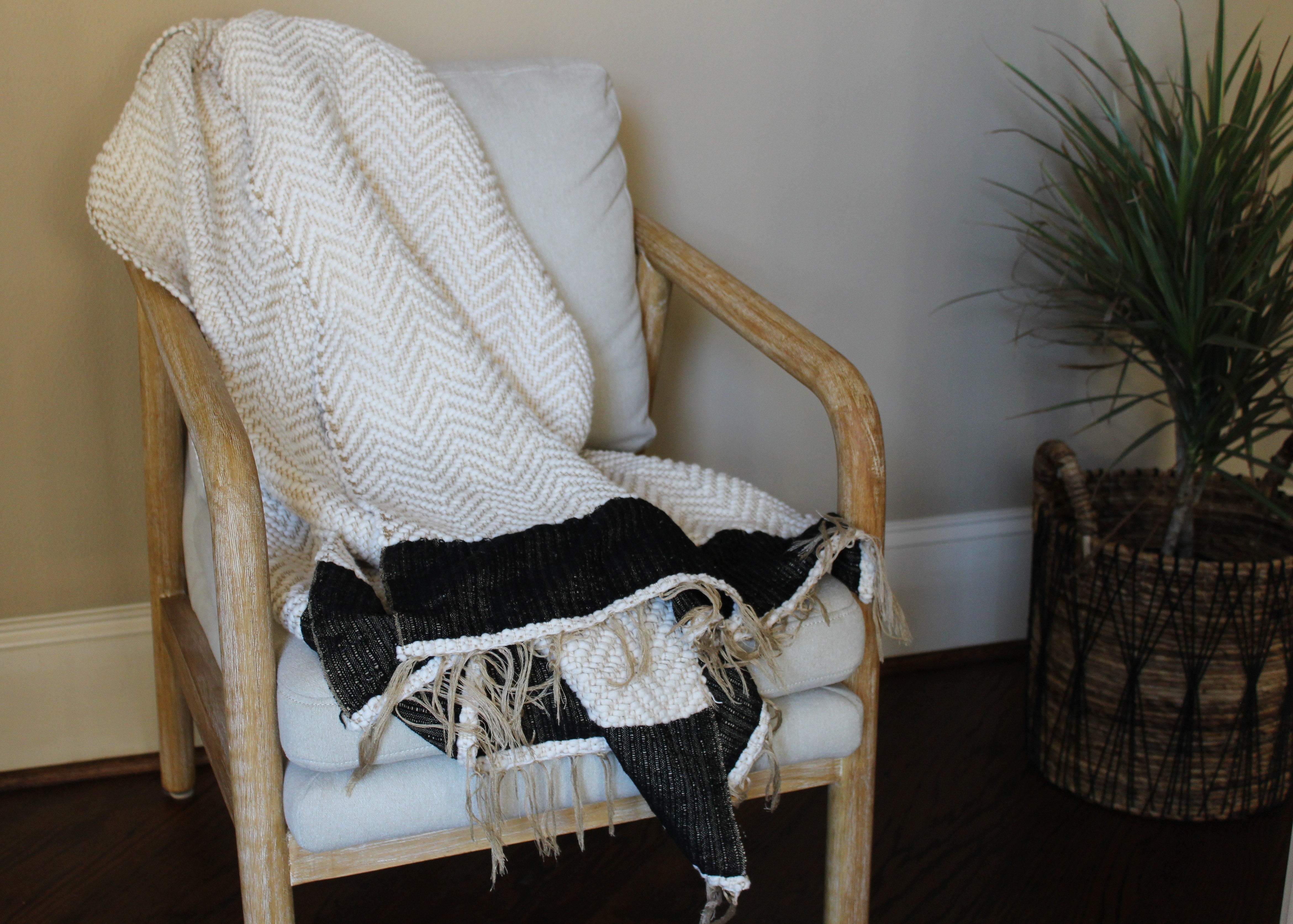 Addis throw blanket with black stripe