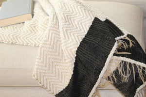 Addis throw blanket with black stripe